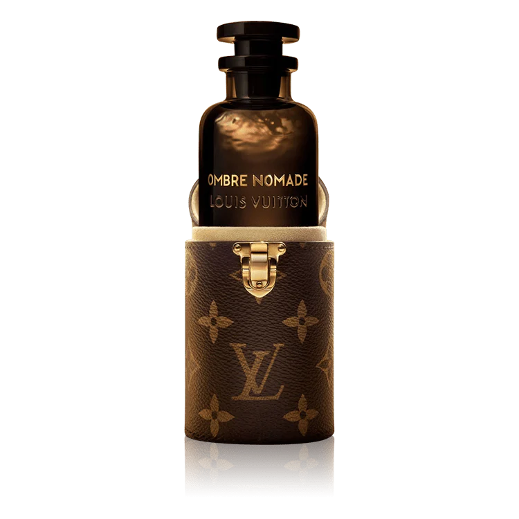 Perfume bottle with monogrammed cover on white background